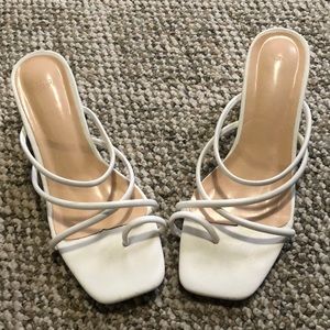 Strappy white heeled sandal